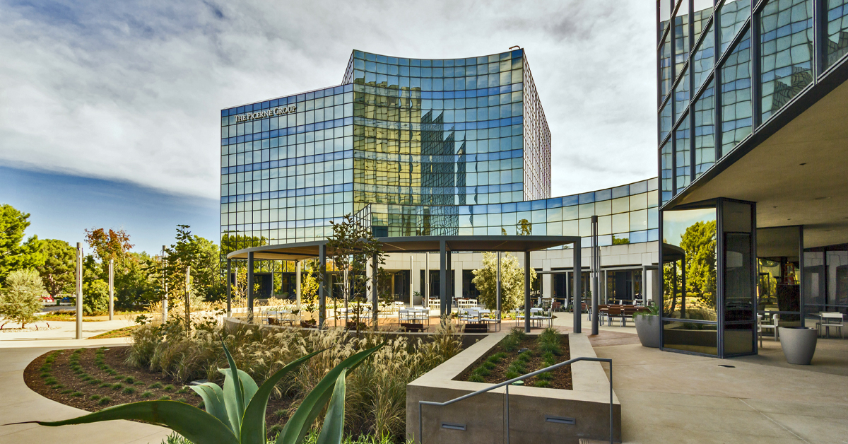 Image of an upscale building with the sky behind it