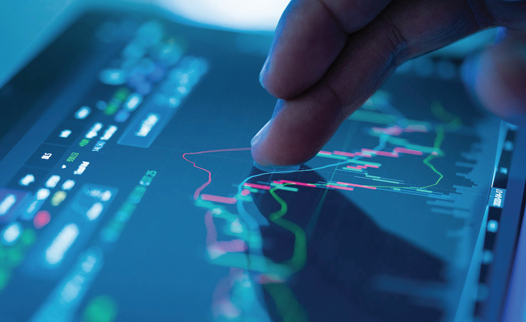 A hand types on a keyboard, symbolizing digital communication, data exchange, and technological innovation in business.