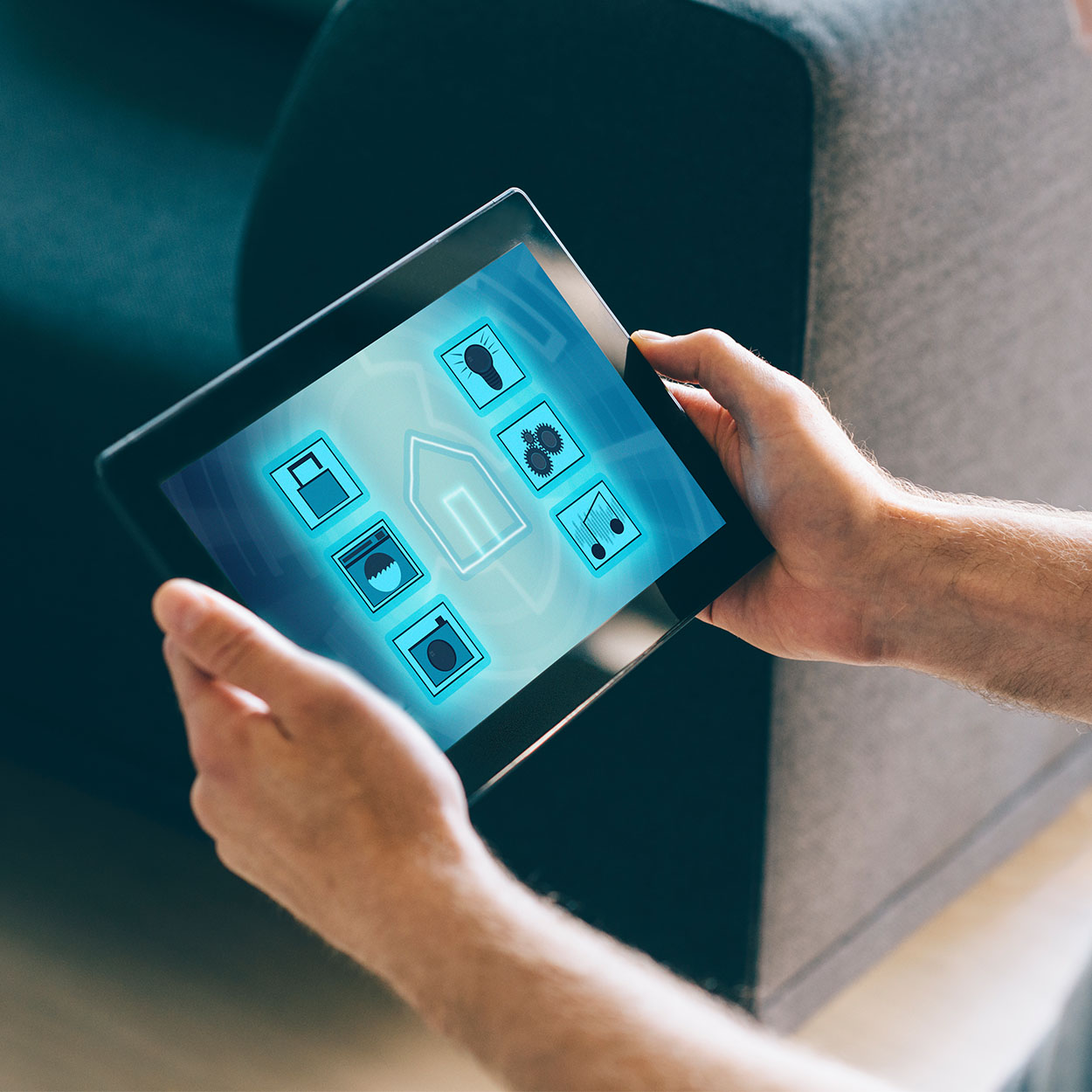 A business professional using advanced technology, navigating the internet on his tablet computer with a finger pad.