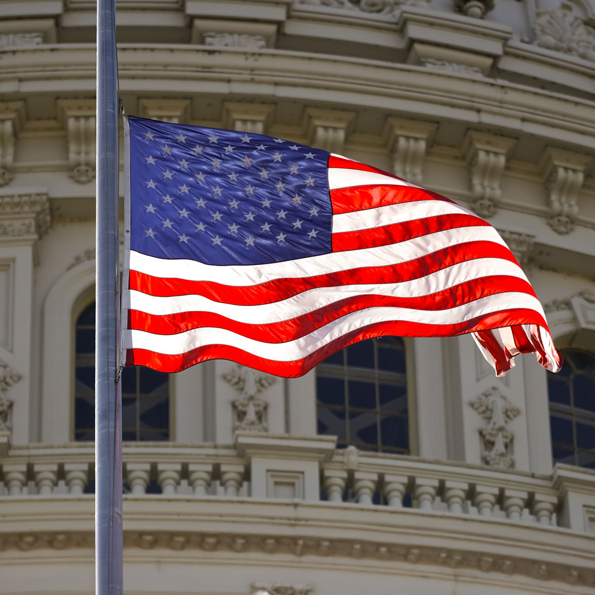 A vibrant display of the American flag showcases red and blue stripes, symbolizing patriotism, freedom, and national pride.