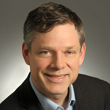 Professional headshot of Ryan Szymanski, CFA