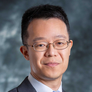 This is a professional head shot image of Yau_headshot_300x300 Eric.