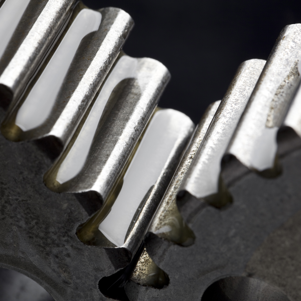 This image represents isolated steel keys and a metal wrench, essential equipment tools set against a neutral background.
