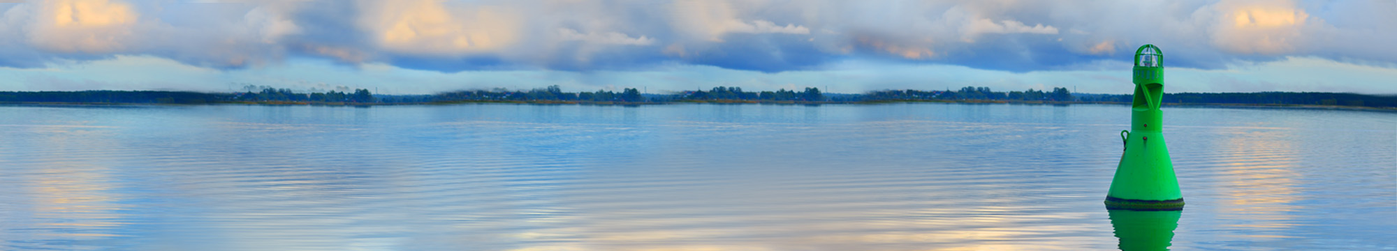 Experience tranquility by the sea, where the blue ocean meets the sky at sunset, surrounded by nature's beauty.