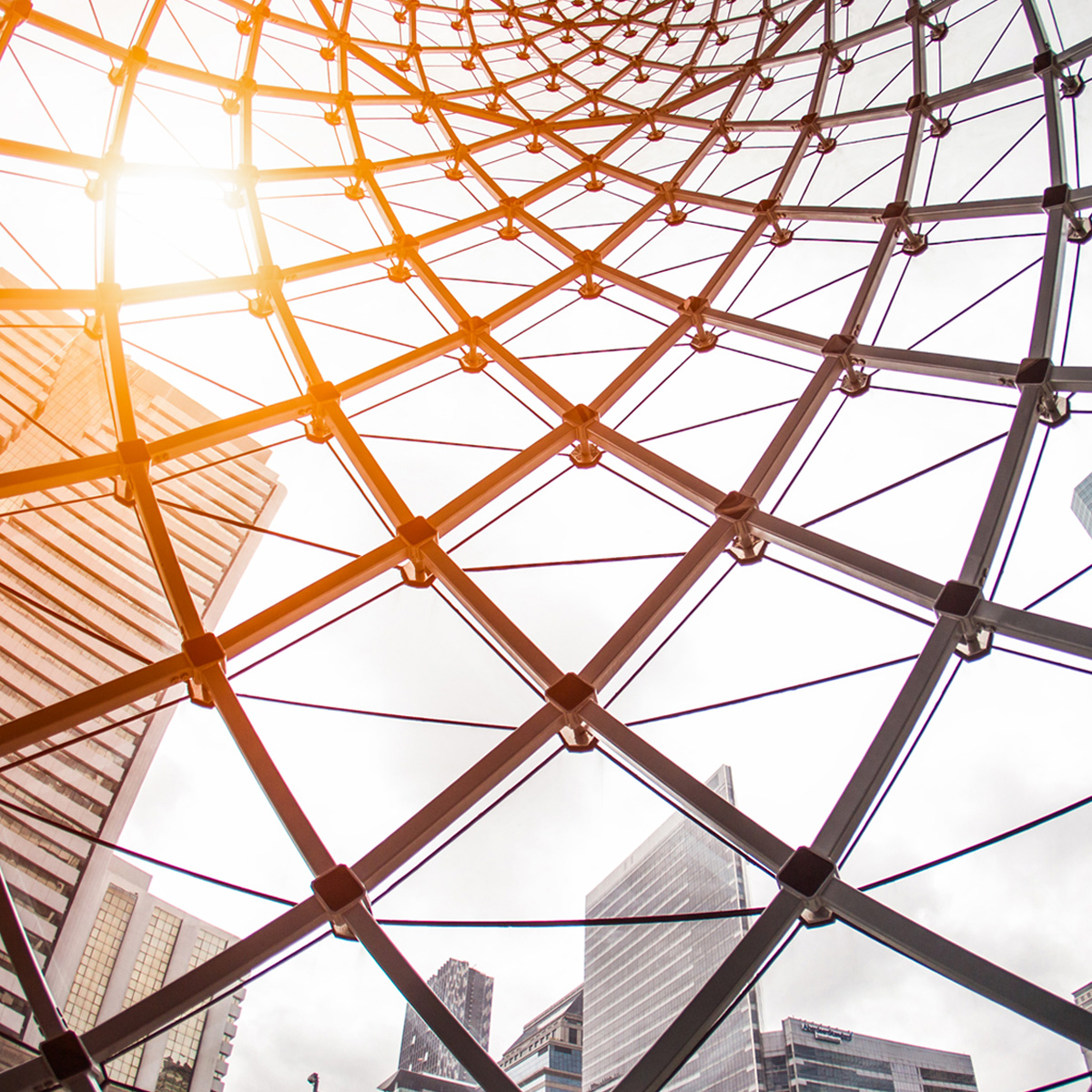 This modern architectural masterpiece features abstract designs with steel, glass, and metal construction, set against a vivid blue background.