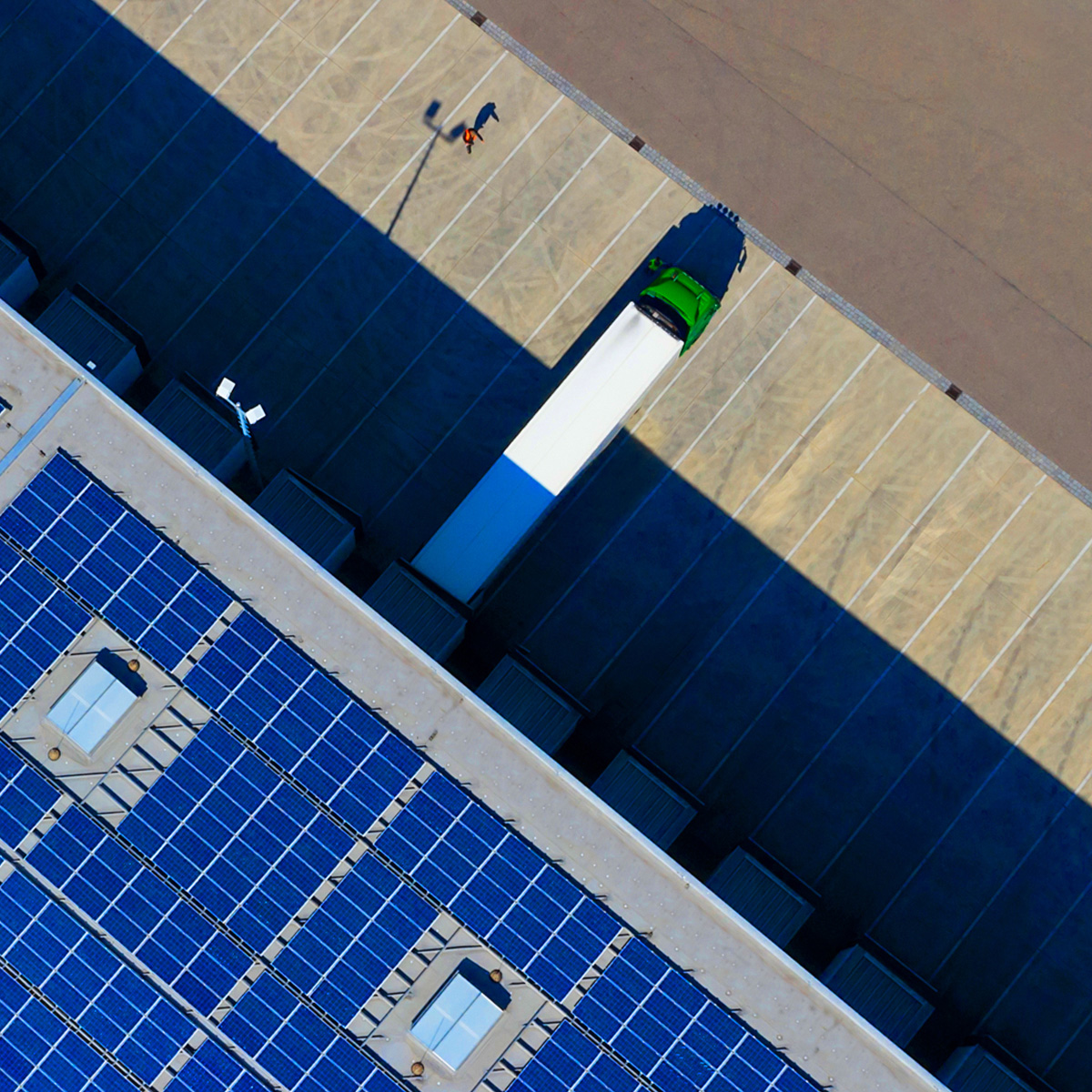 Modern blue glass office buildings create an abstract city landscape, exemplifying business architecture.