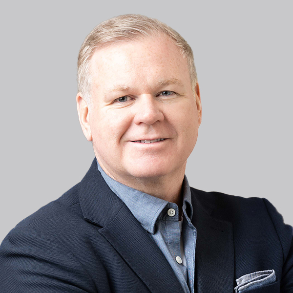 Professional headshot of Andrew G. Arnott